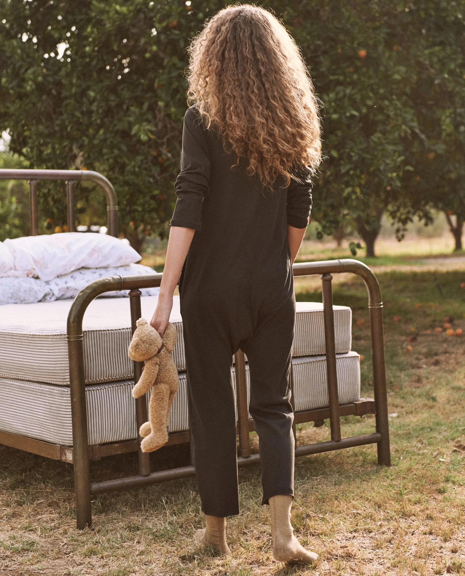 The Long Sleeve Sleeper Jumpsuit. -- ALMOST BLACK