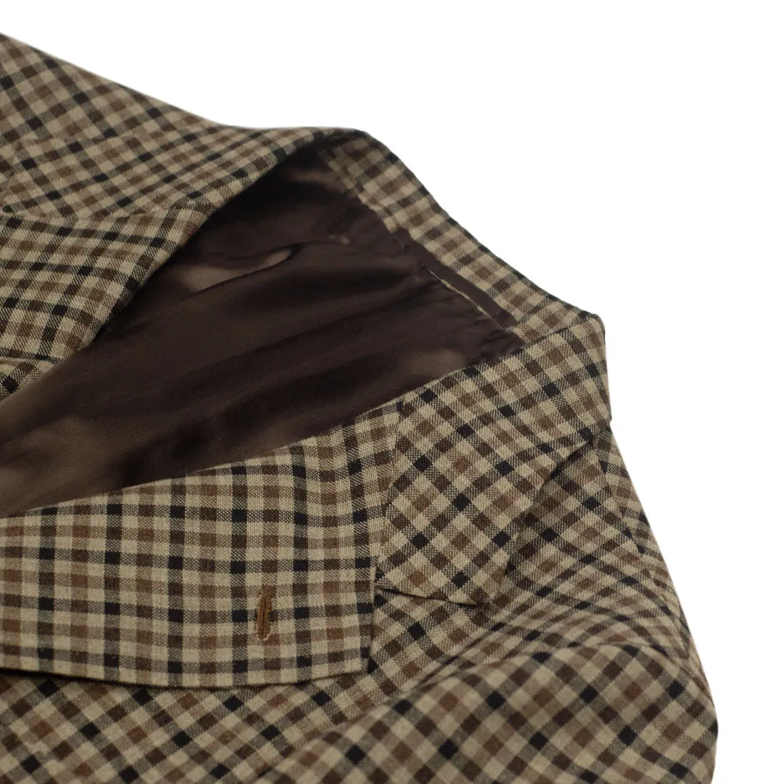 x Sartoria Carrara: Sport coat in tan and charcoal guncheck Fox Air 2-ply wool 10/11oz